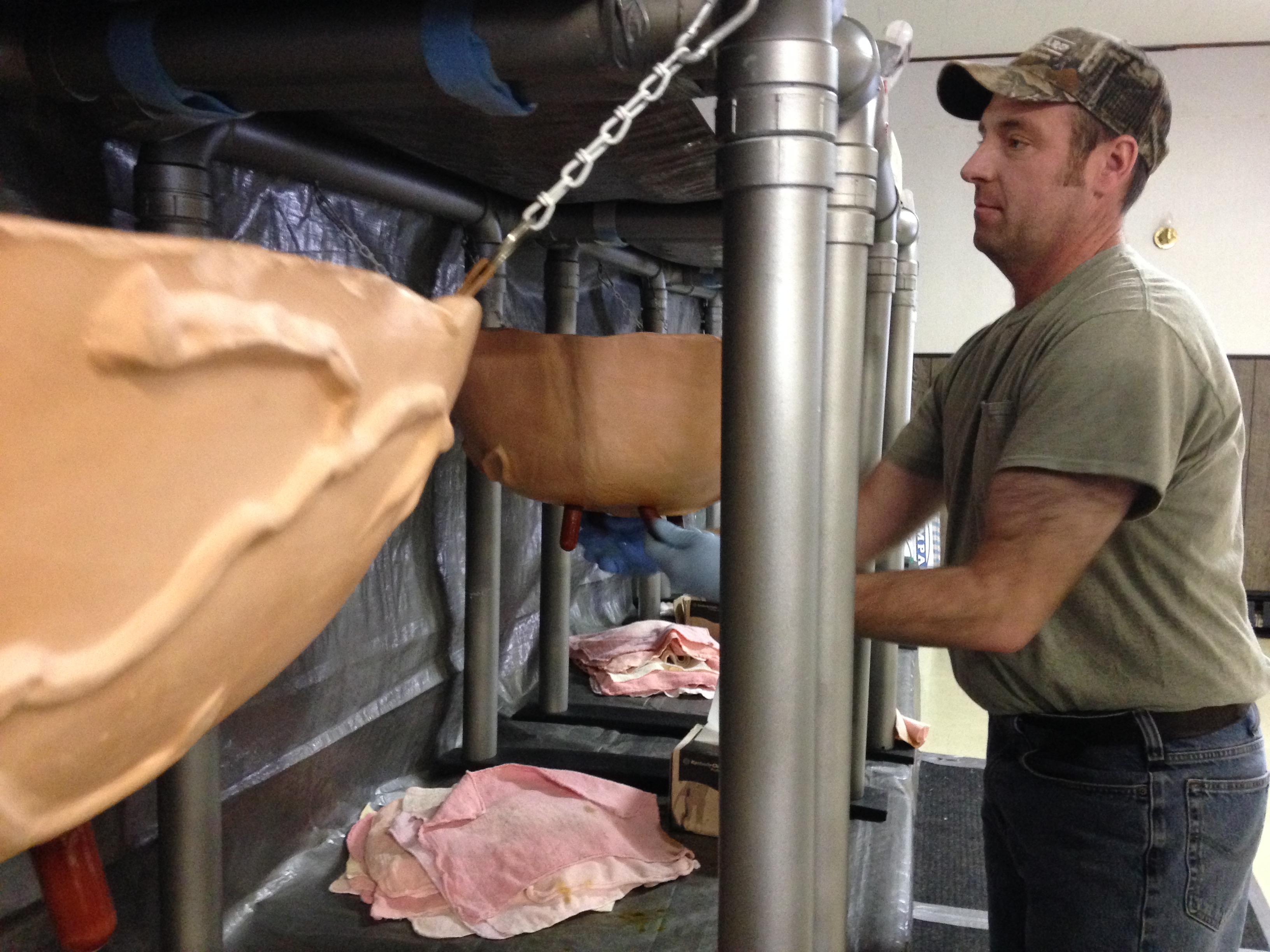 Jeremy Beebe learns milking techniques